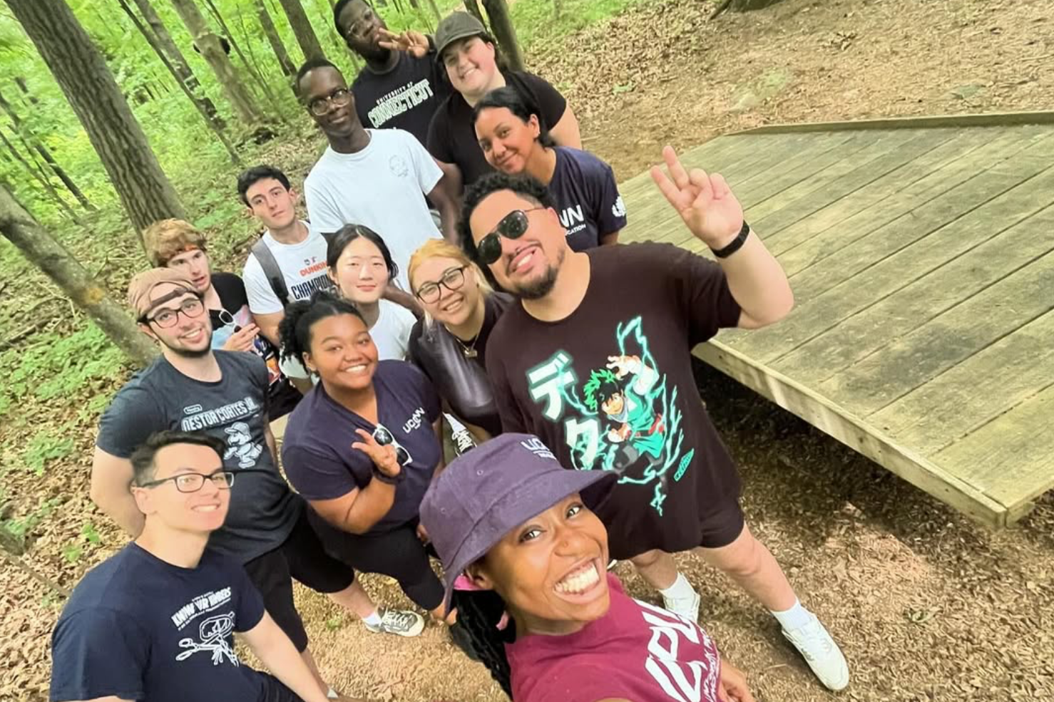 Group of students pose with featured speaker from Leadership Conference
